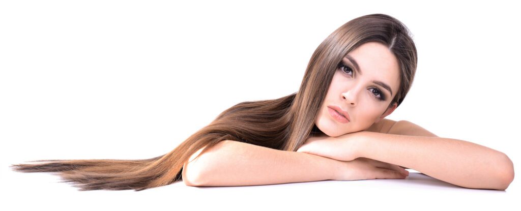 beautiful young woman with long hair isolated white